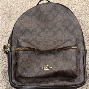 Gently Used Coach Charlie Brown and Black Backpack